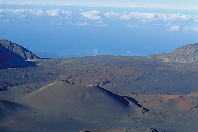 Hana Rainforest and Haleakala Crater Helicopter Tour - Climbing the eastern flank of Haleakala