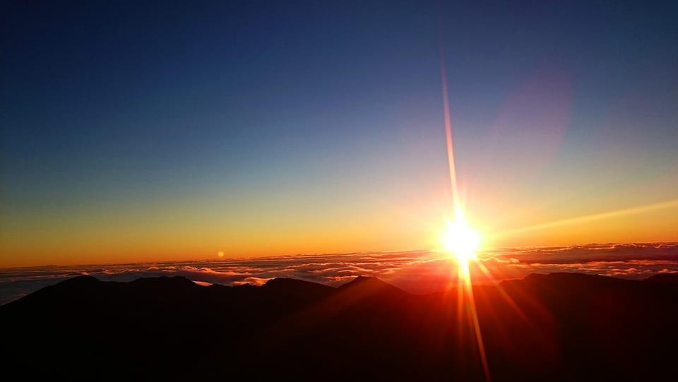 Maui: Haleakala Sunrise Tour with Pick-up - Watching the sun appear over Haleakalā