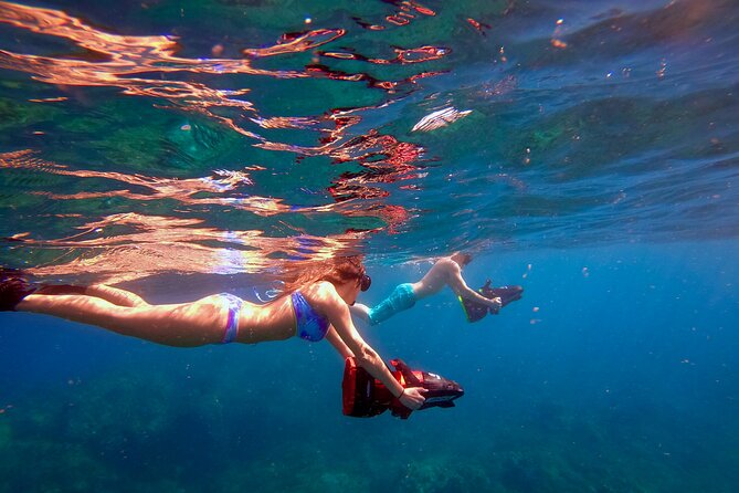 Turtle Town Underwater Scooter Snorkeling Tour with GoPro - Who will enjoy this most